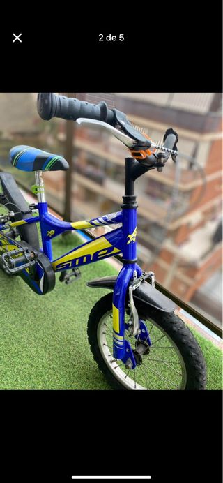 Bicicleta infantil azul y amarilla