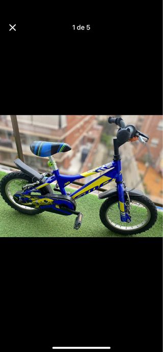 Bicicleta infantil azul y amarilla