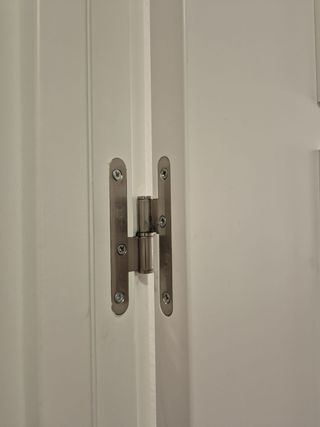 Puerta doble blanca con cristal
