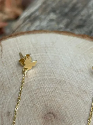 Pendientes largos mariposa dorados