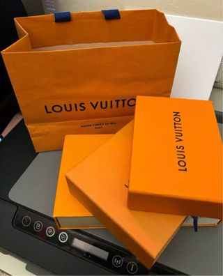 Scatole e sacchetto Louis Vuitton arancioni