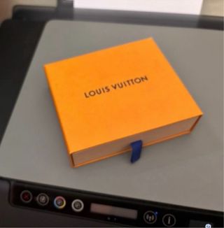 Scatole e sacchetto Louis Vuitton arancioni