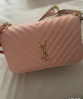 Bolso YSL rosa con cadena dorada