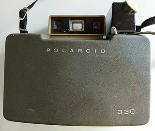 2 Fotocamere Vintage: Polaroid e Konica