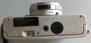 2 Fotocamere Vintage: Polaroid e Konica