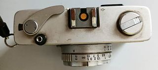 2 Fotocamere Vintage: Polaroid e Konica