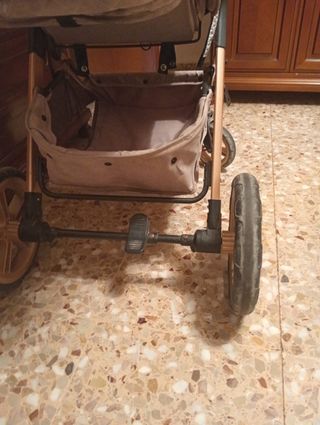Carro de bebé color beige