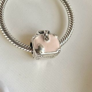 CHARM MALETA ROSA VIAJE 