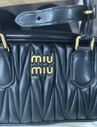 Miu Miu Bolsa Bowling Matelassé Preta