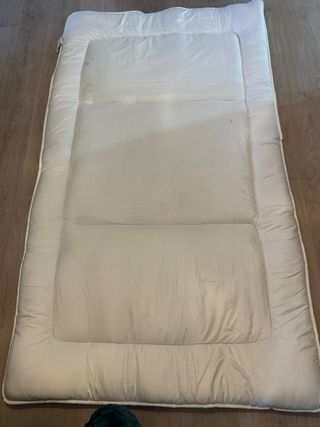 Futón japonés con ropa de cama