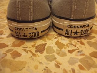 Converse grises y blancas como neuva 