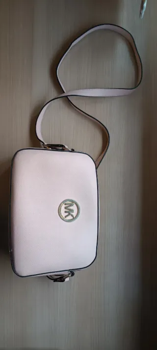 Bolso Michael Kors rosa y dorado