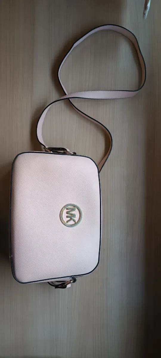 Bolso Michael Kors rosa y dorado