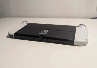 Nintendo Switch OLED + controller wireless + giochi