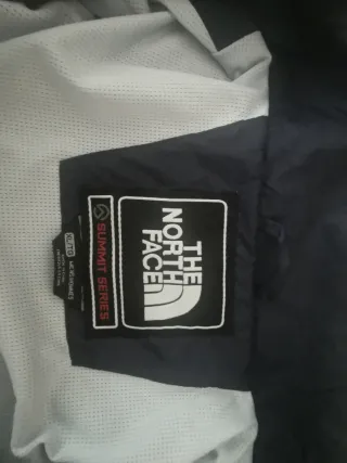 Cortavientos The North Face azul y naranja
