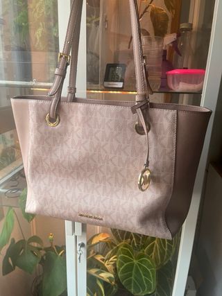 Bolso Michael Kors rosa y dorado