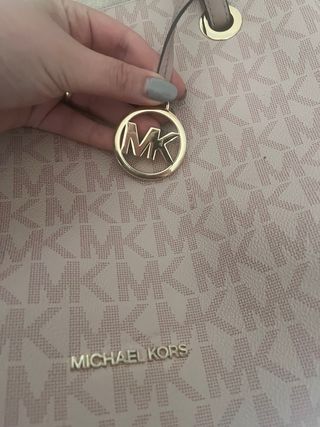 Bolso Michael Kors rosa y dorado