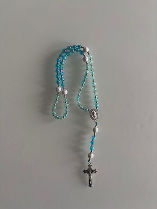 Rosario, collares, pendientes y denarios.