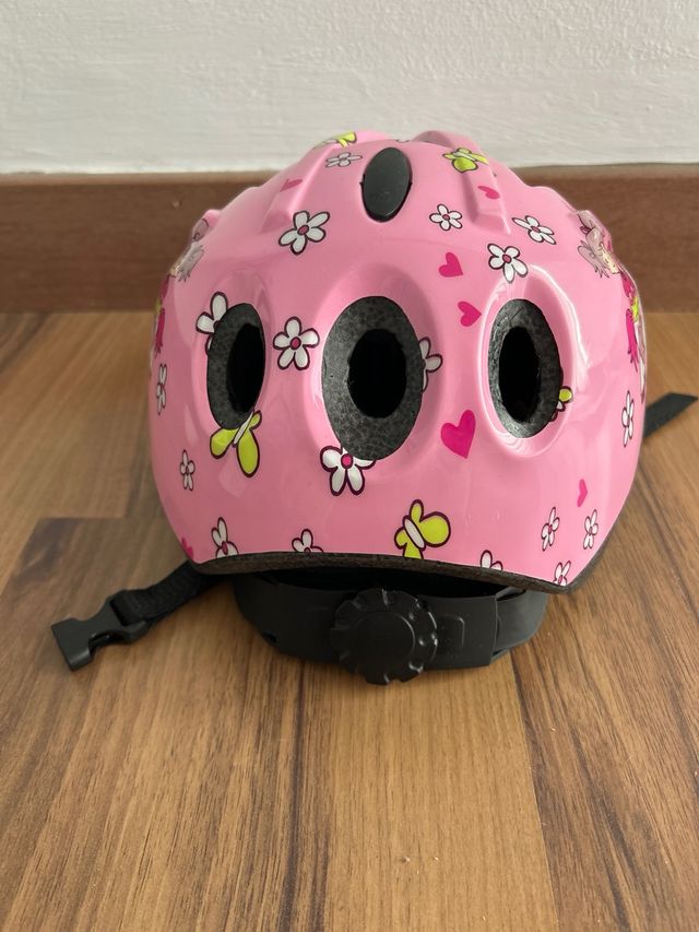 Casco infantil rosa con dibujos, talla S