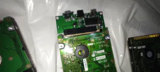 Lote de discos duros y adaptador
