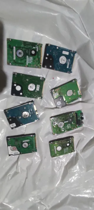 Lote de discos duros y adaptador