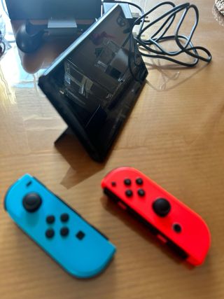 Nintendo Switch OLED blu/rosso