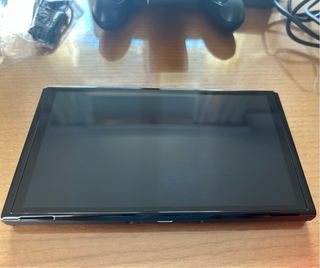 Nintendo Switch OLED blu/rosso