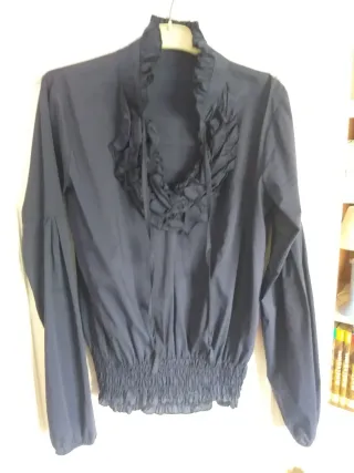 Romántica blusa con detalle de volantes