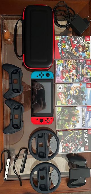 Nintendo Switch + Accesorios y Juegos