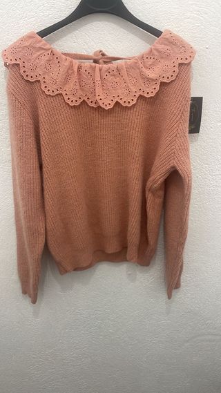Jersey rosa con volante y espalda descubierta