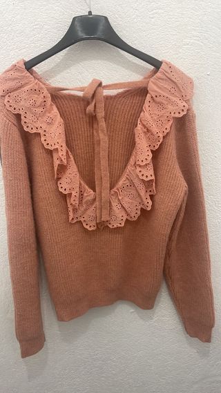 Jersey rosa con volante y espalda descubierta
