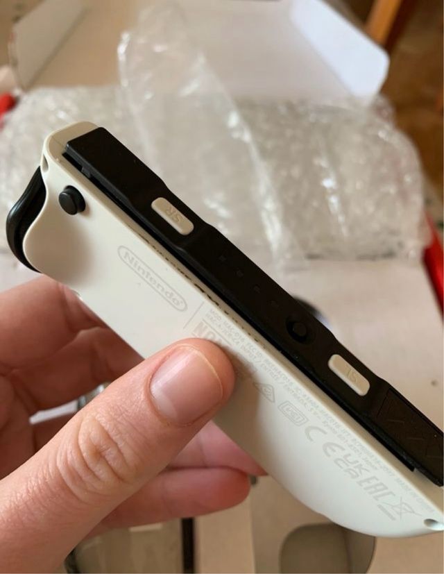 Nintendo Switch OLED + Funda Blackfire