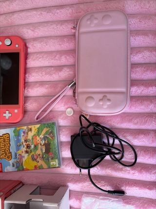 Nintendo Switch Lite Coral + Animal Crossing