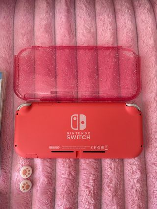 Nintendo Switch Lite Coral + Animal Crossing
