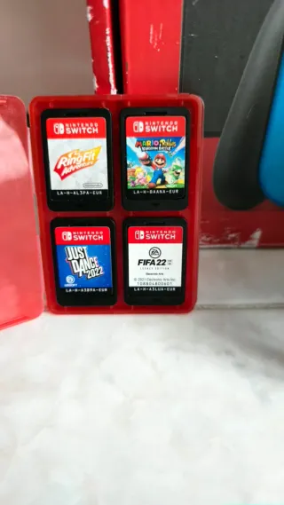 Nintendo Switch OLED + 4 Giochi