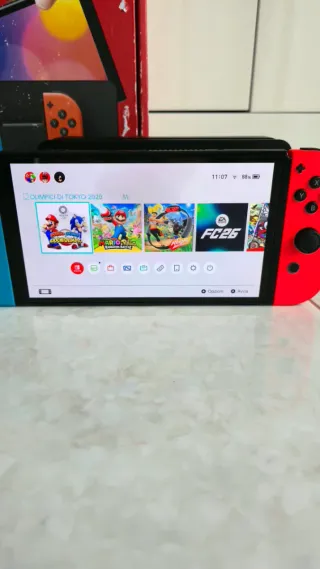 Nintendo Switch OLED + 4 Giochi