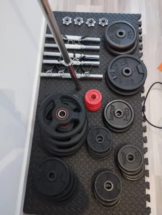 Material de gimnasio: Mancuernas, discos y más