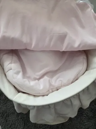 Muñeca Reborn con saco rosa