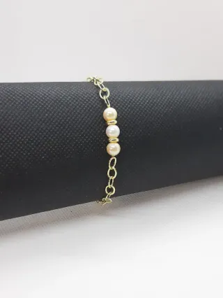 Pulsera bañada en oro con perlas