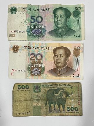 Billetes de Tanzania y China