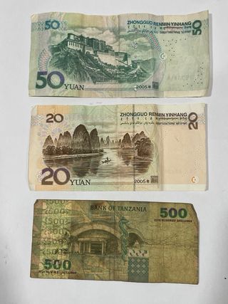 Billetes de Tanzania y China