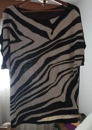 Jersey estampado cebra beige y negro. 