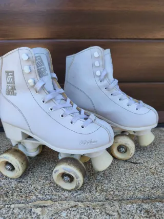 Patines 4 ruedas blancos talla 34
