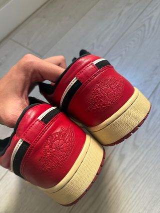 Jordan 1 Low Negro Rojo Blanco