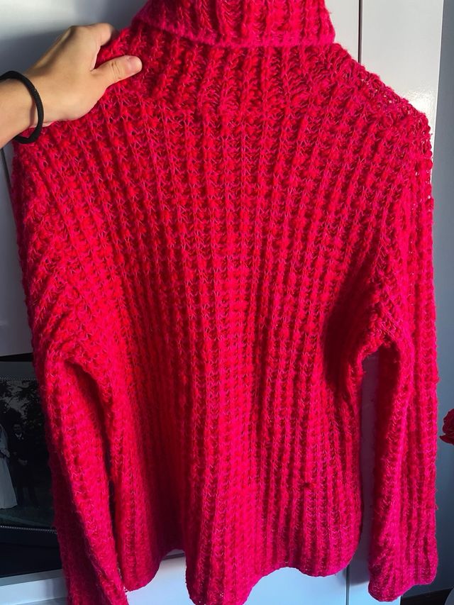 Jersey de punto cuello alto rosa y rojo