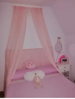 Dosel rosa para cama infantil