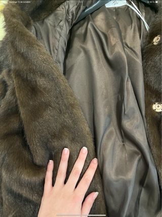 Pelliccia sintetica con cappuccio