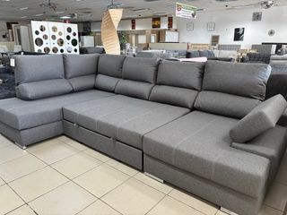 Sofá rinconera gris con doble chaise longue cama