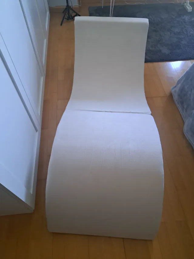 Cheslong plegable beige de tela