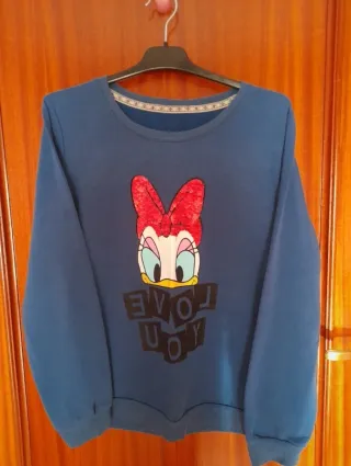 Jersey azul de Daisy con lentejuelas